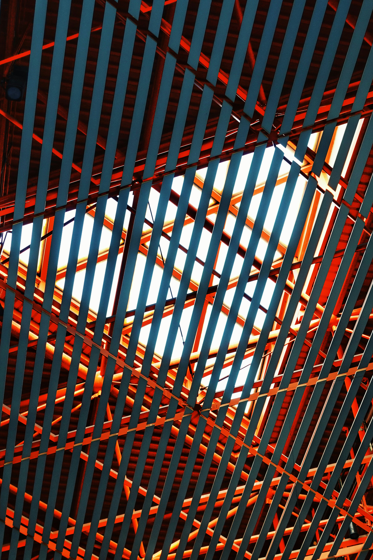 looking up through red abstract flooring